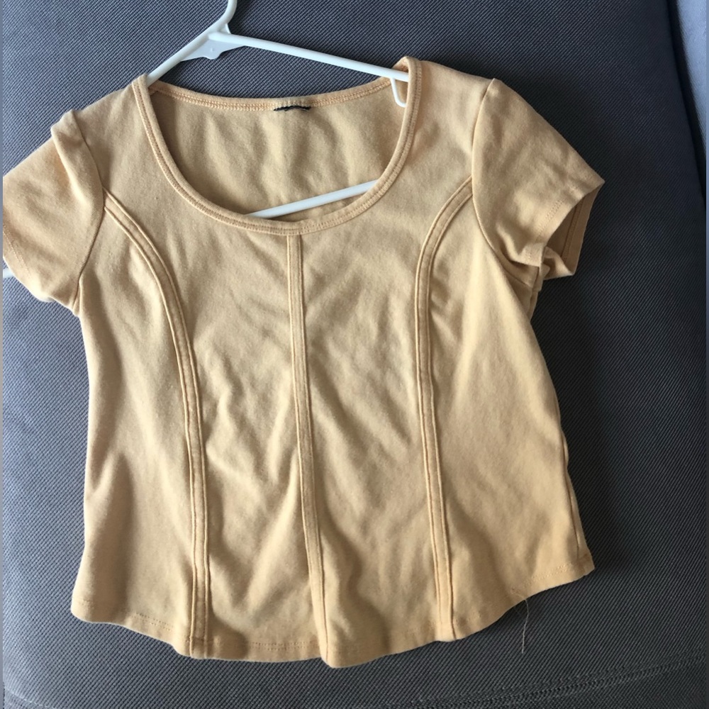 Pale yellow target cropped top